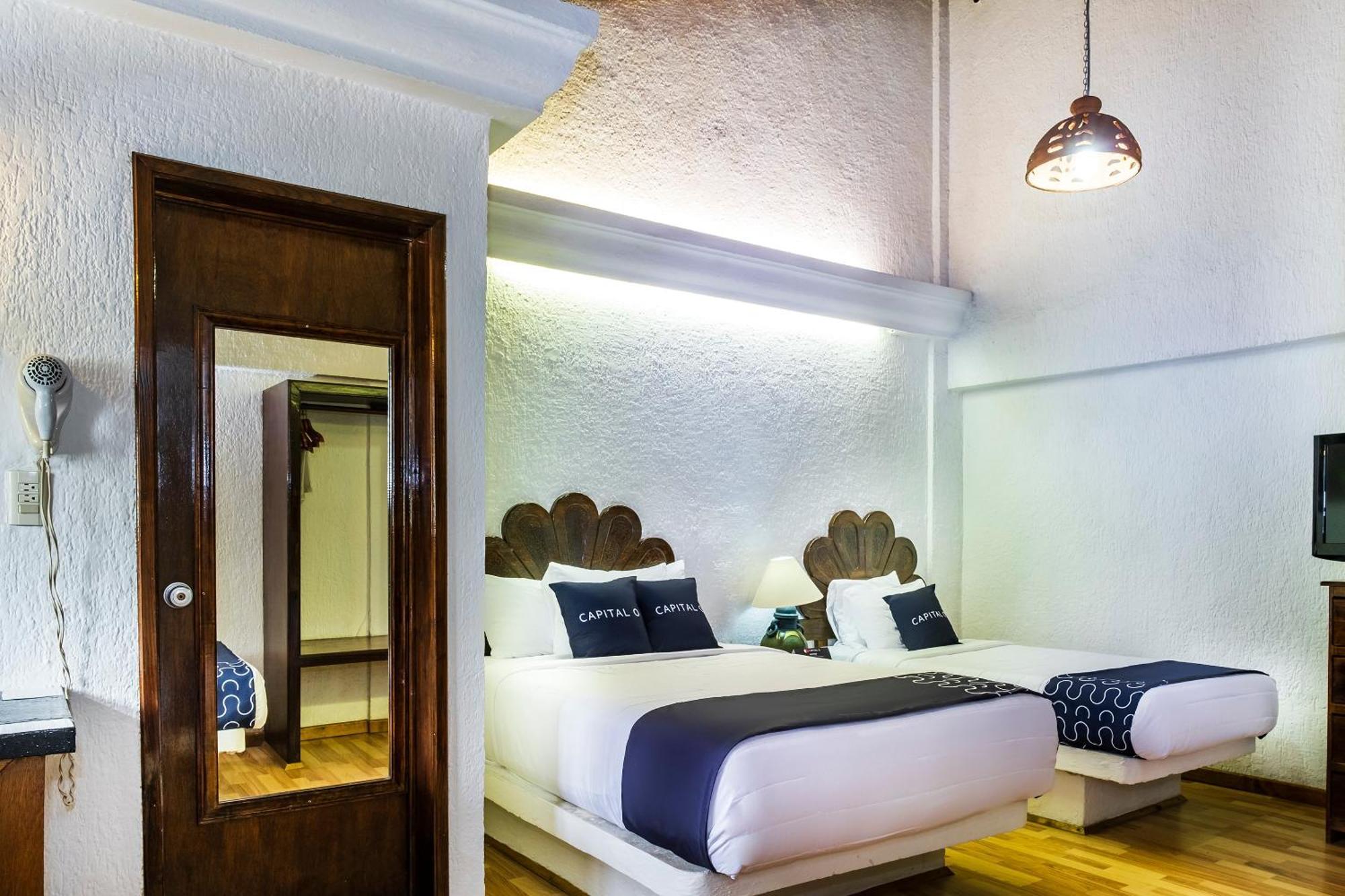 Capital O Hotel Central, خالابا المظهر الخارجي الصورة
