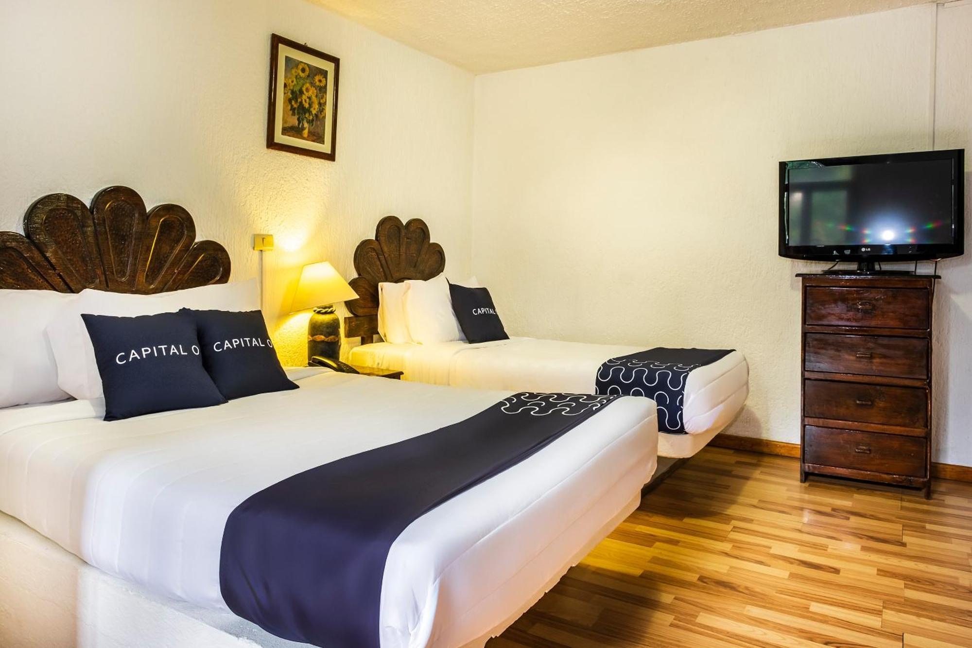 Capital O Hotel Central, خالابا المظهر الخارجي الصورة