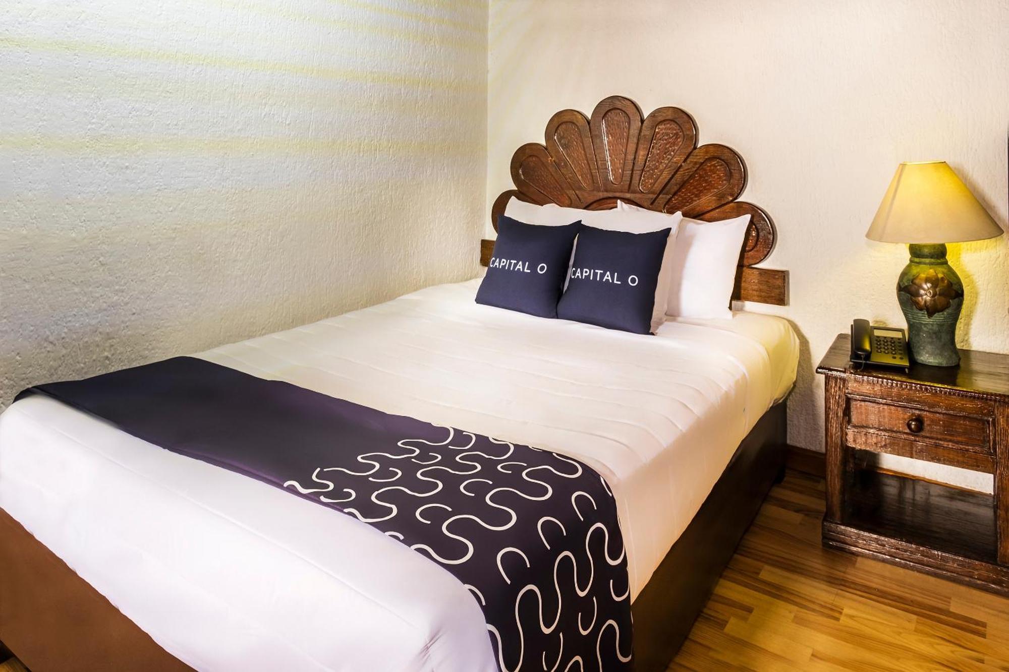 Capital O Hotel Central, خالابا المظهر الخارجي الصورة