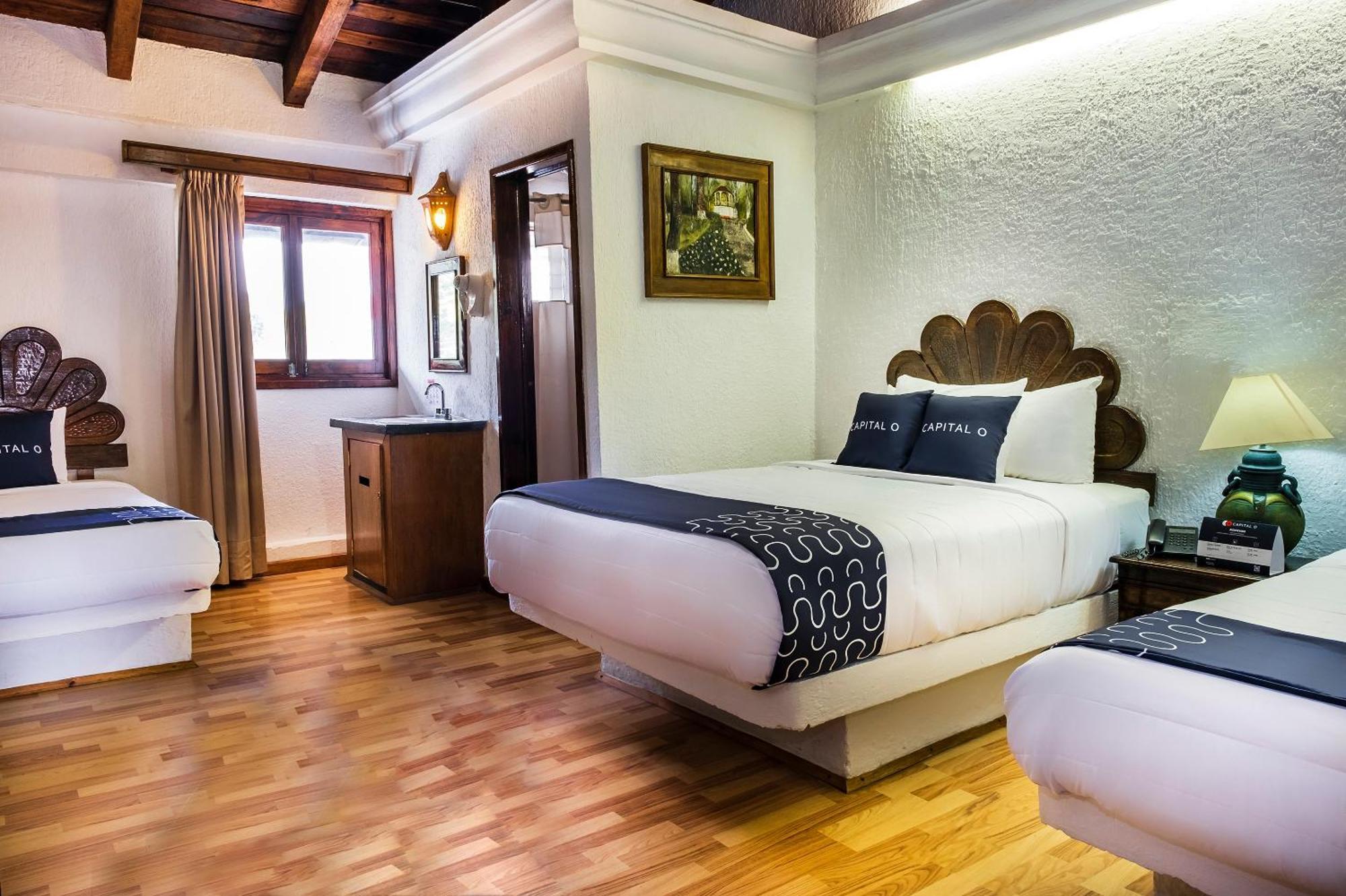 Capital O Hotel Central, خالابا المظهر الخارجي الصورة