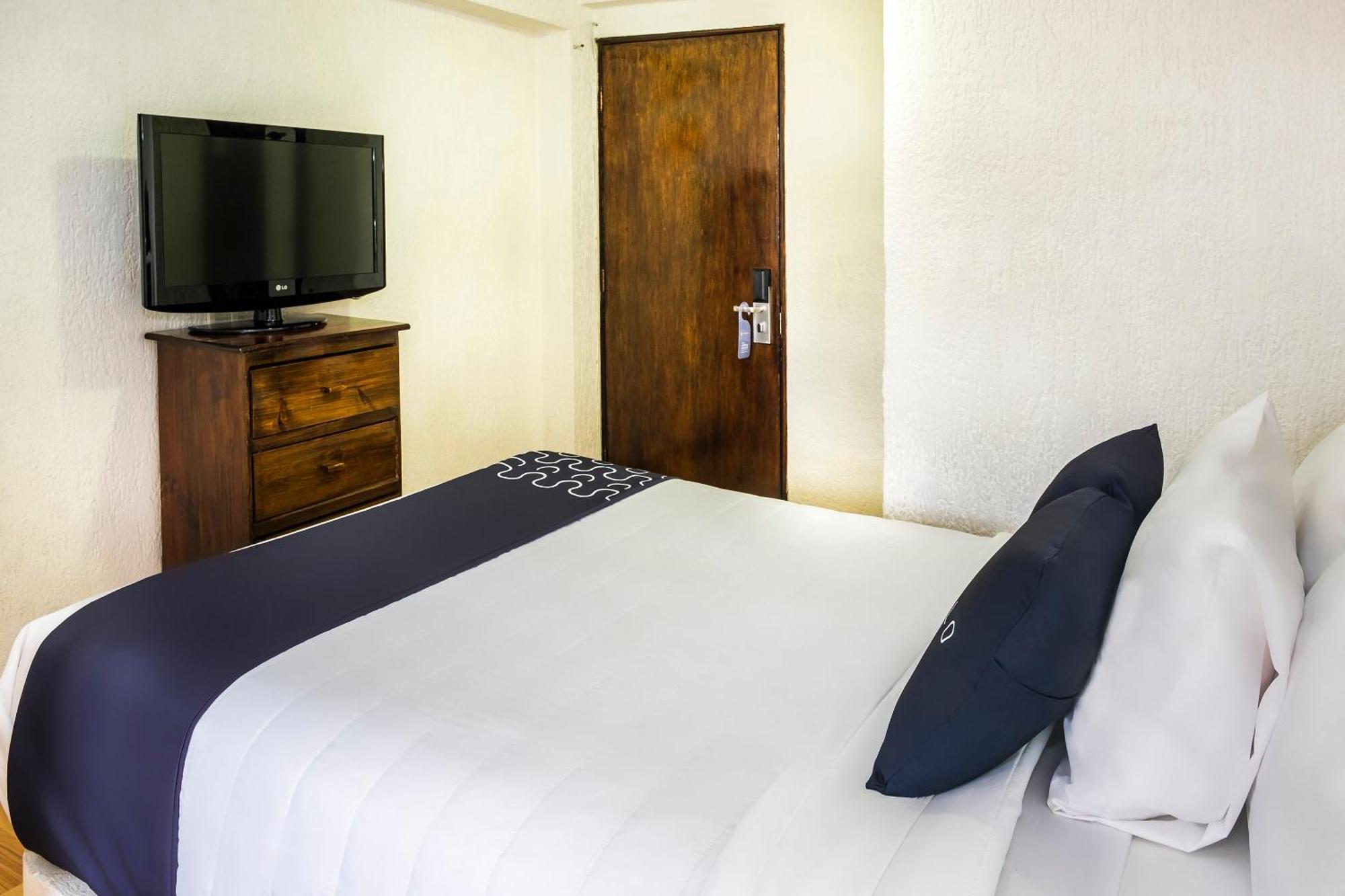 Capital O Hotel Central, خالابا المظهر الخارجي الصورة