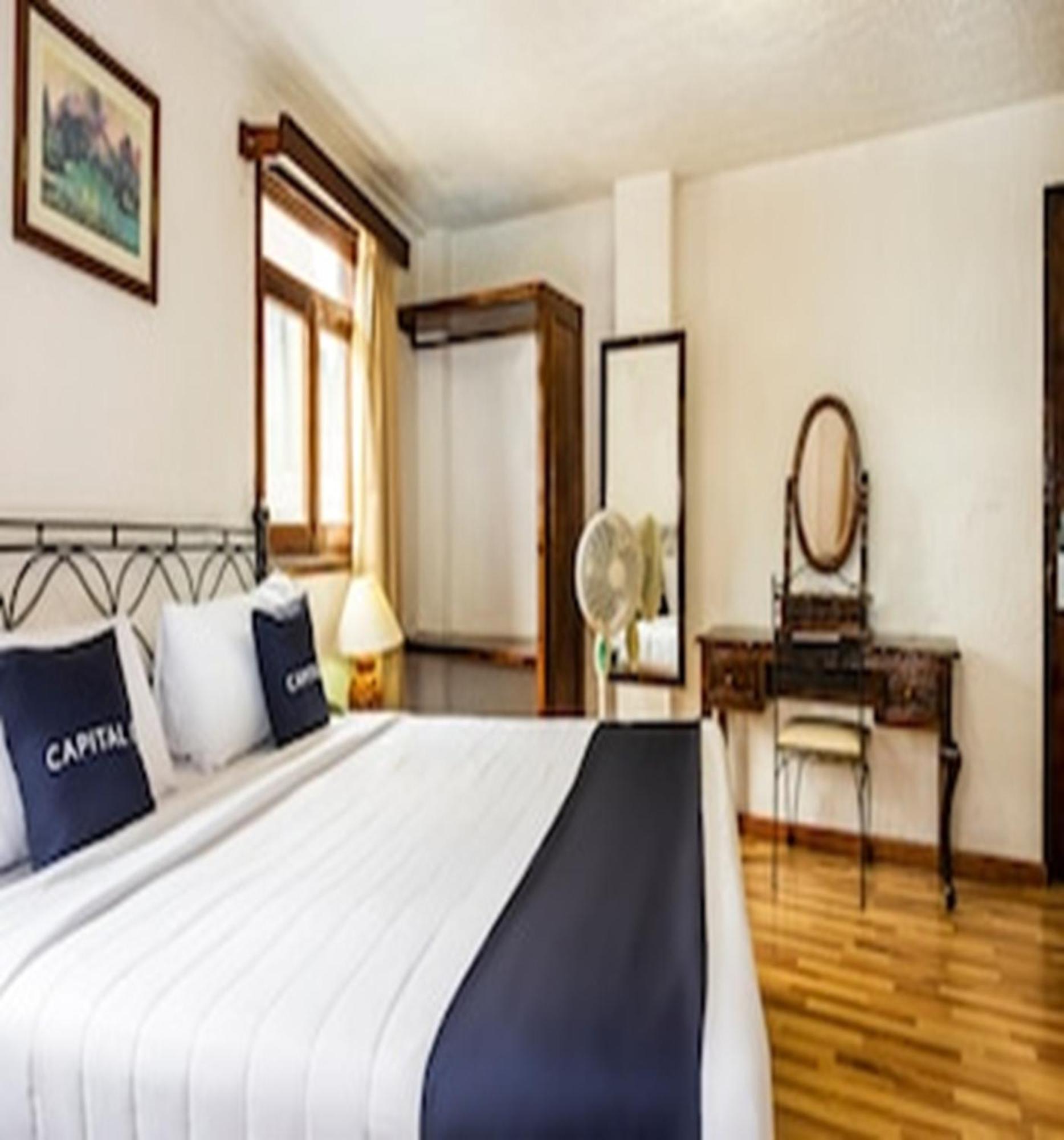 Capital O Hotel Central, خالابا المظهر الخارجي الصورة